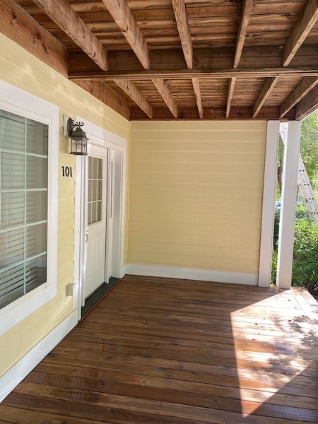 Pressure-washed covered porch deck